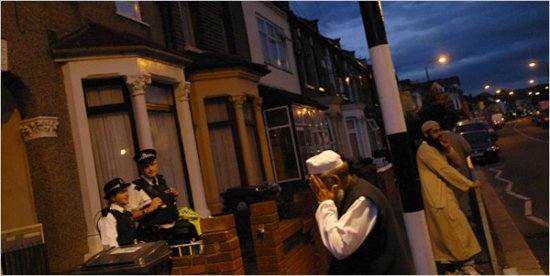 British police officers guarded a house raided earlier in London’s Walthamstow District.